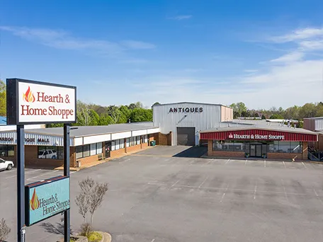 Hearth and Home Shoppe - New Location Picture - Right Side With Street Sign