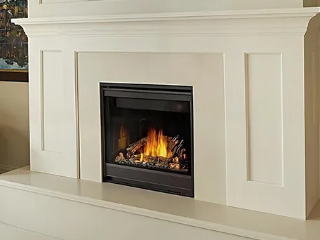 Modern gas fireplace with a cream-colored mantel and hearth.